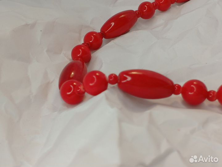 Украшение из красного камня