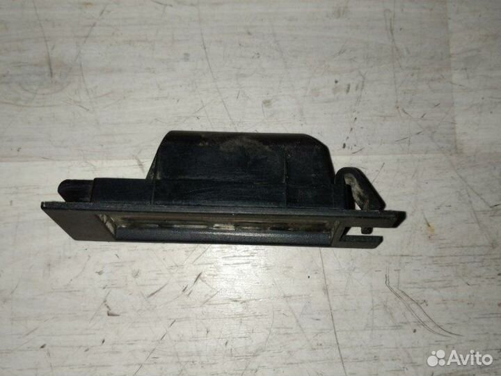 Подсветка номерного знака задняя Opel Astra J