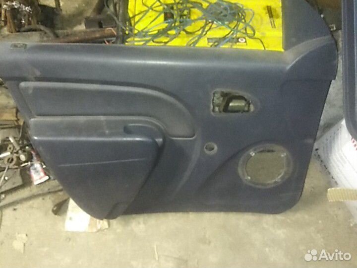 Дверные карты Рено Логан 2007г