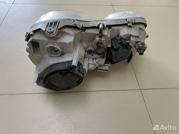 Фара левая Mercedes CL W215