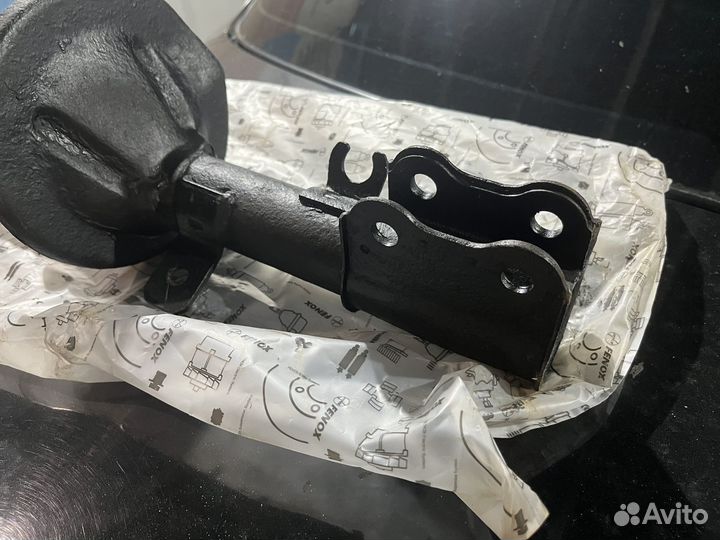 Стойки передние Kia Spectra