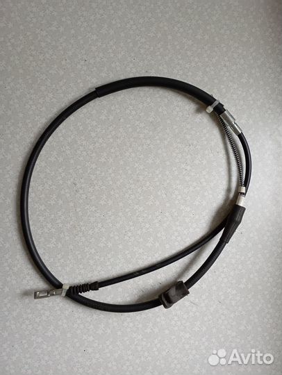 Трос стояночного тормоза задний NK 904770