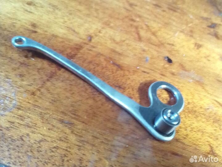 Нитеоттягиватель