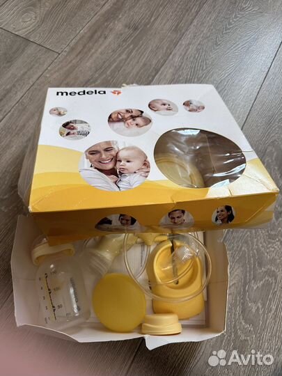 Молокоотсос medela электрический