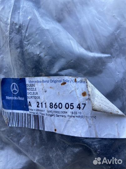 Форсунка омывателя фар Е211