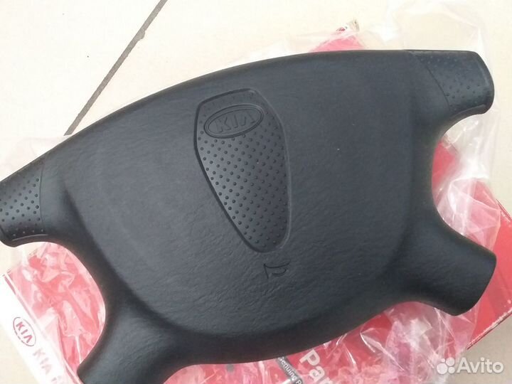 Накладка руля Kia 0K2N1-32800-02
