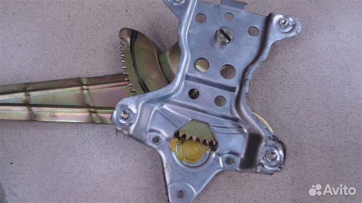 Стеклоподъемник задний левый электрический Nissan