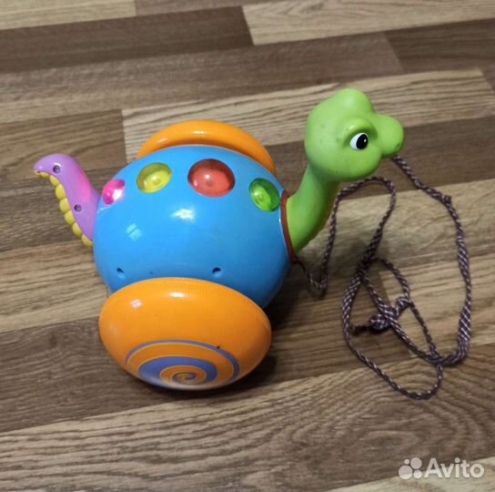 Развивающая игрушка. Каталка музыкальная