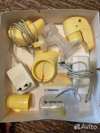 Молокоотсос medela mini electric