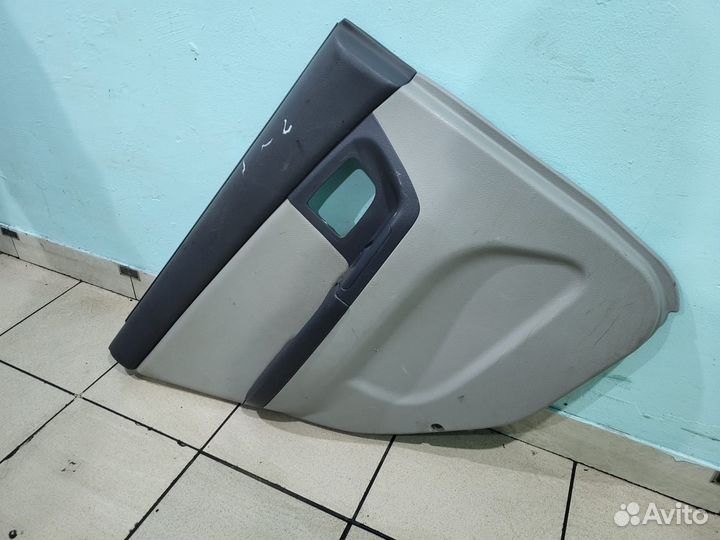 Обшивка двери задняя левая Kia Cerato 1