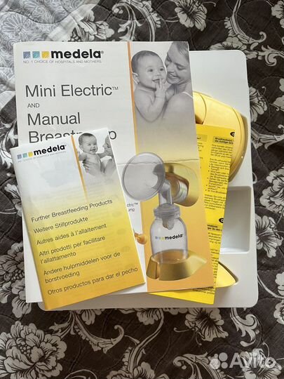 Молокоотсос medela mini electric