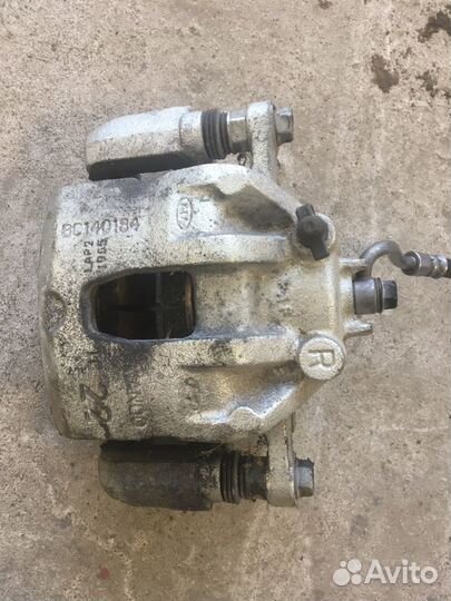 Суппорт передний правый Kia Rio 3 (5966)