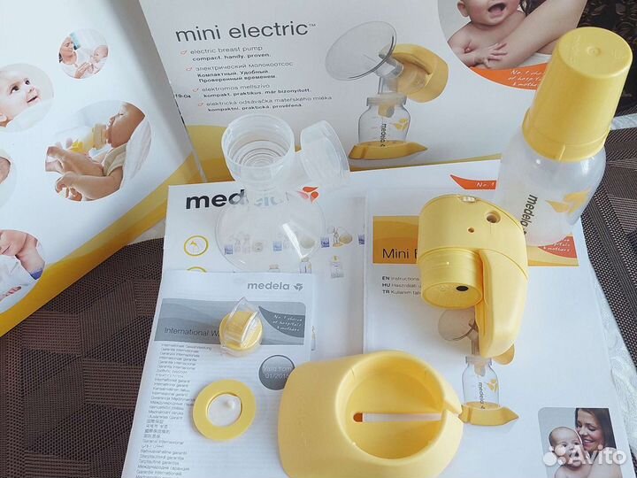 Молокоотсос medela электрический