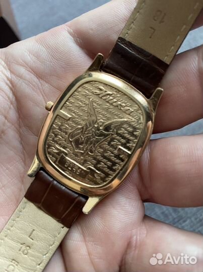 Часы золотые