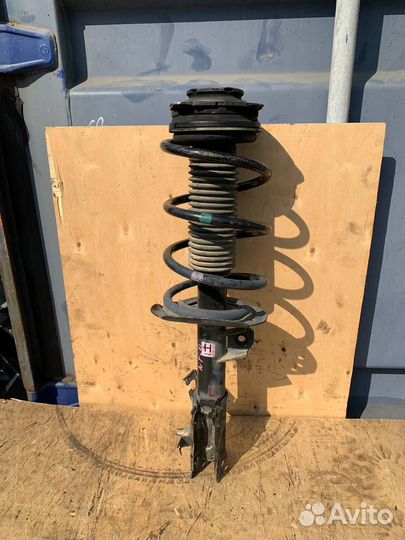 Амортизатор передний левый Nissan X-Trail T31