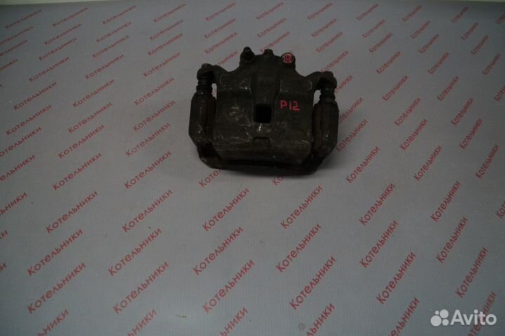 Nissan 41001-AU001 Суппорт тормозной правый