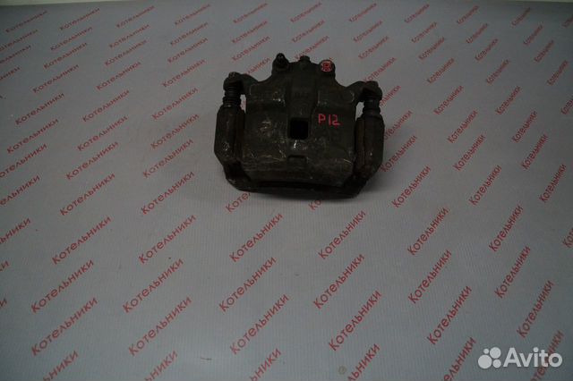 Nissan 41001-AU001 Суппорт тормозной правый