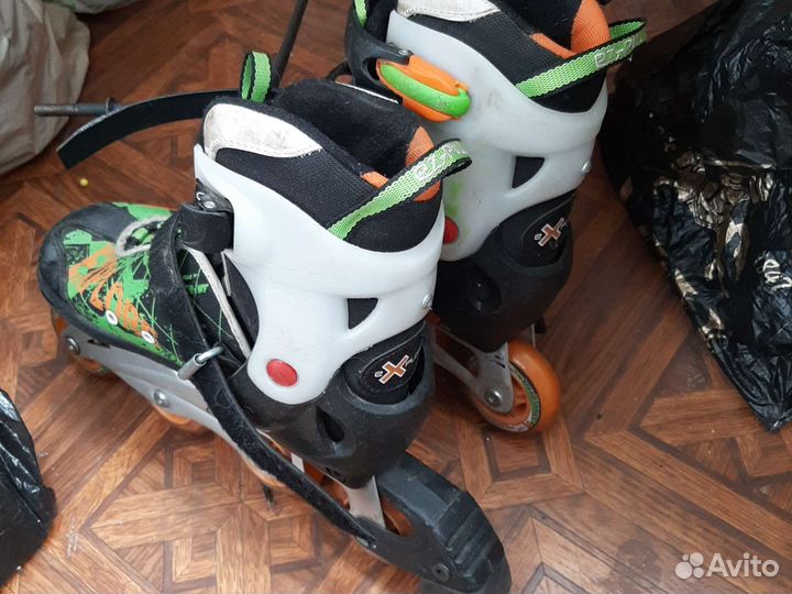 Роликовые коньки