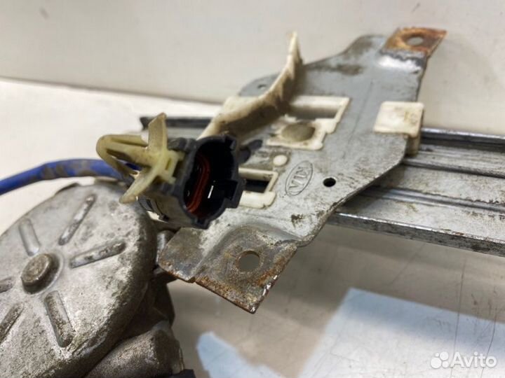 Мотор стеклоподъемника задний правый Kia Spectra