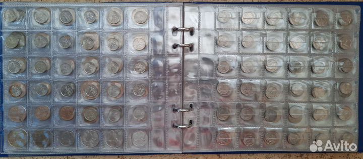 Коллекция монет в альбоме на 708 ячеек