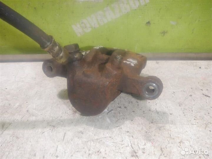 Суппорт задний правый Тойота Королла Е120