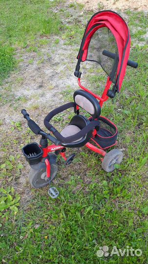 Трехколесный велосипед с ручкой