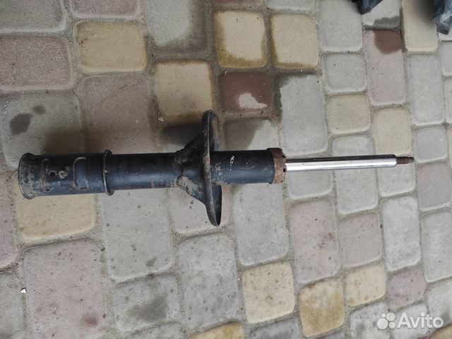 Mitsubishi lancer амортизатор перед MN101957