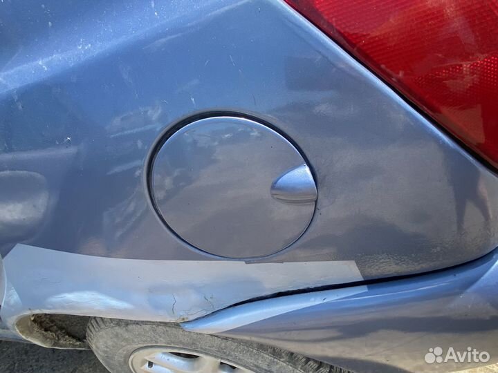 Лючок бензобака Ford Fiesta Mk4