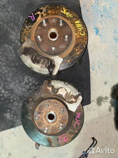 Поворотный кулак Mitsubishi lancer 10 в сборе