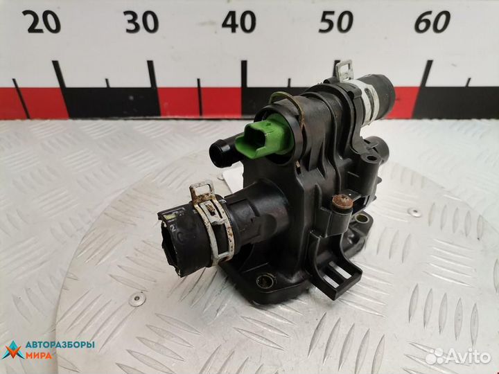 Корпус термостата Ford Fiesta 5 рест. 2009