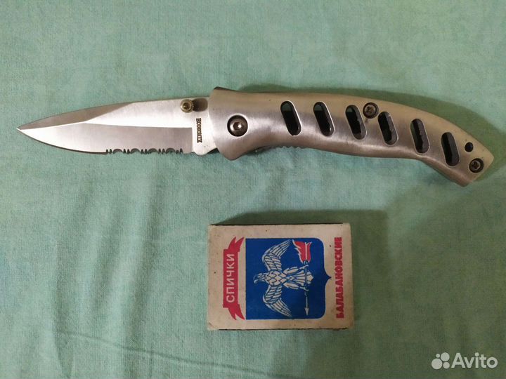 Нож складной полусеррейтор для рыболова