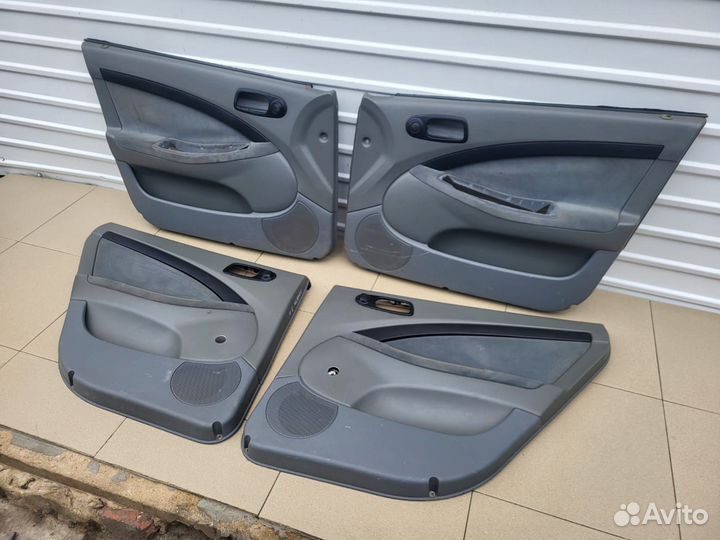 Обшивка двери комплект Chevrolet Лачетти