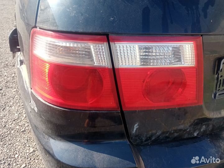 Фонарь внешний левый на Киа Каренс 2004 год