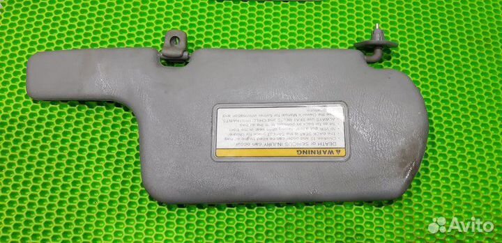 Козырек солнцезащитный левый Nissan Almera Classic