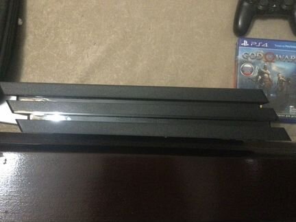 PS4 pro + 2 dualshock + зарядная станция + 2 игры