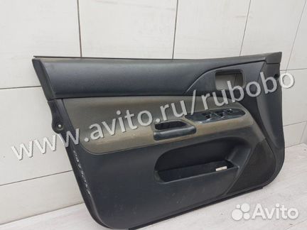 Обшивка двери передняя левая Mitsubishi Lancer 9
