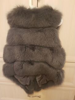 Меховая жилетка