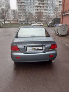 Mitsubishi Lancer 1.6 МТ, 2009, 140 000 км